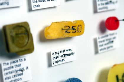 20 Numbered Objects (Including Game Counters & Garment Size Tags). 2009.